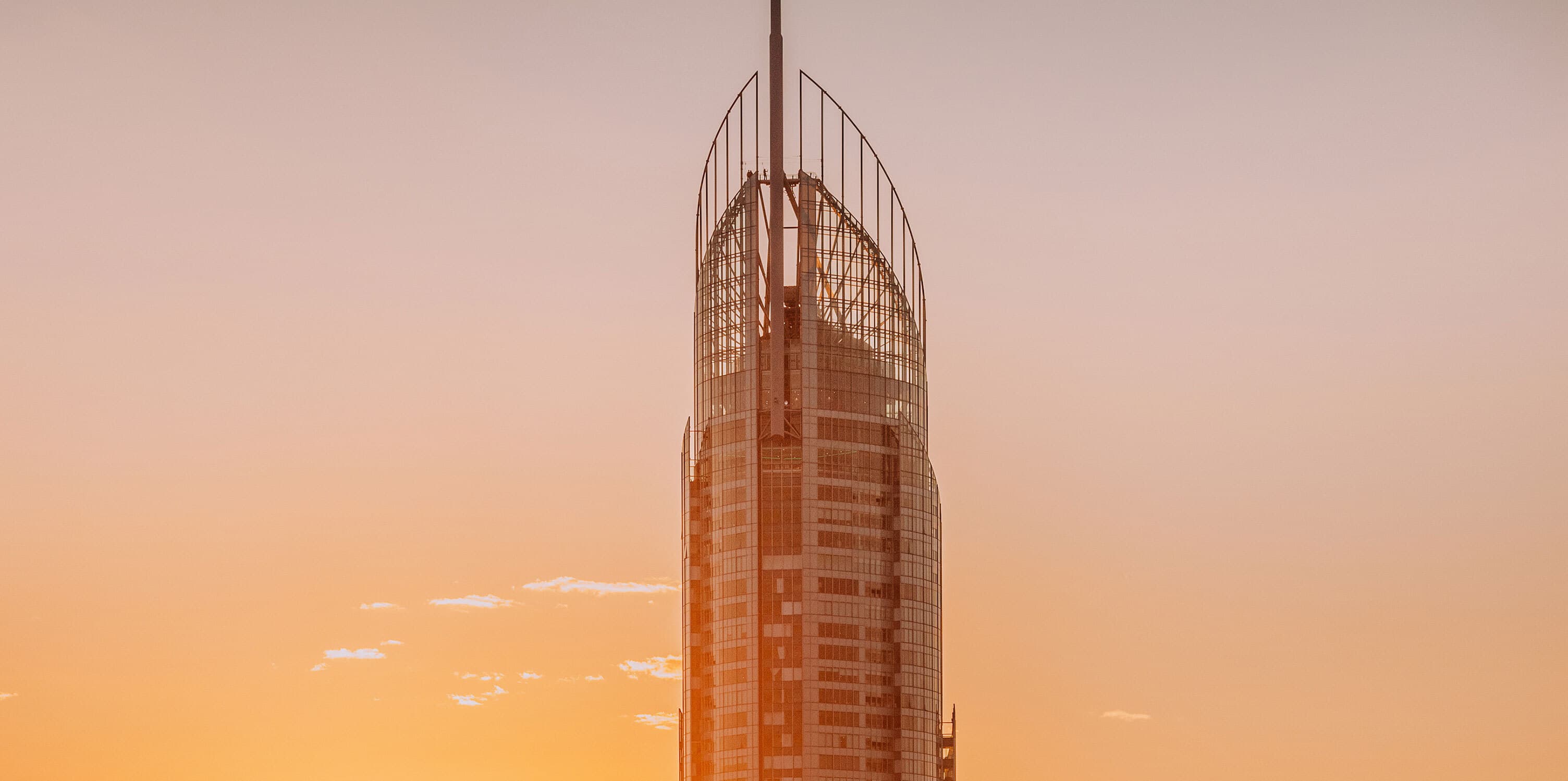 Q1 high-rise at sunset.